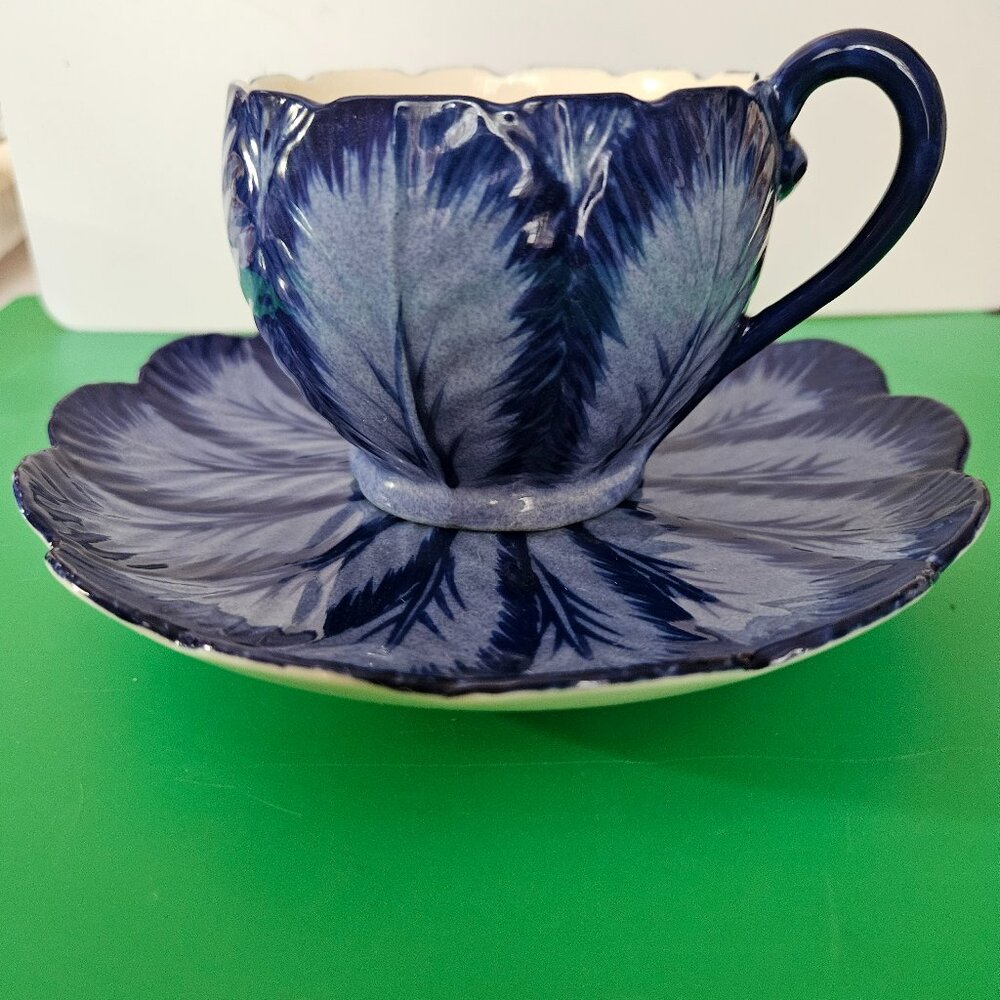 I garden of Eden blue on blue teacup &saucer rare floral great condition